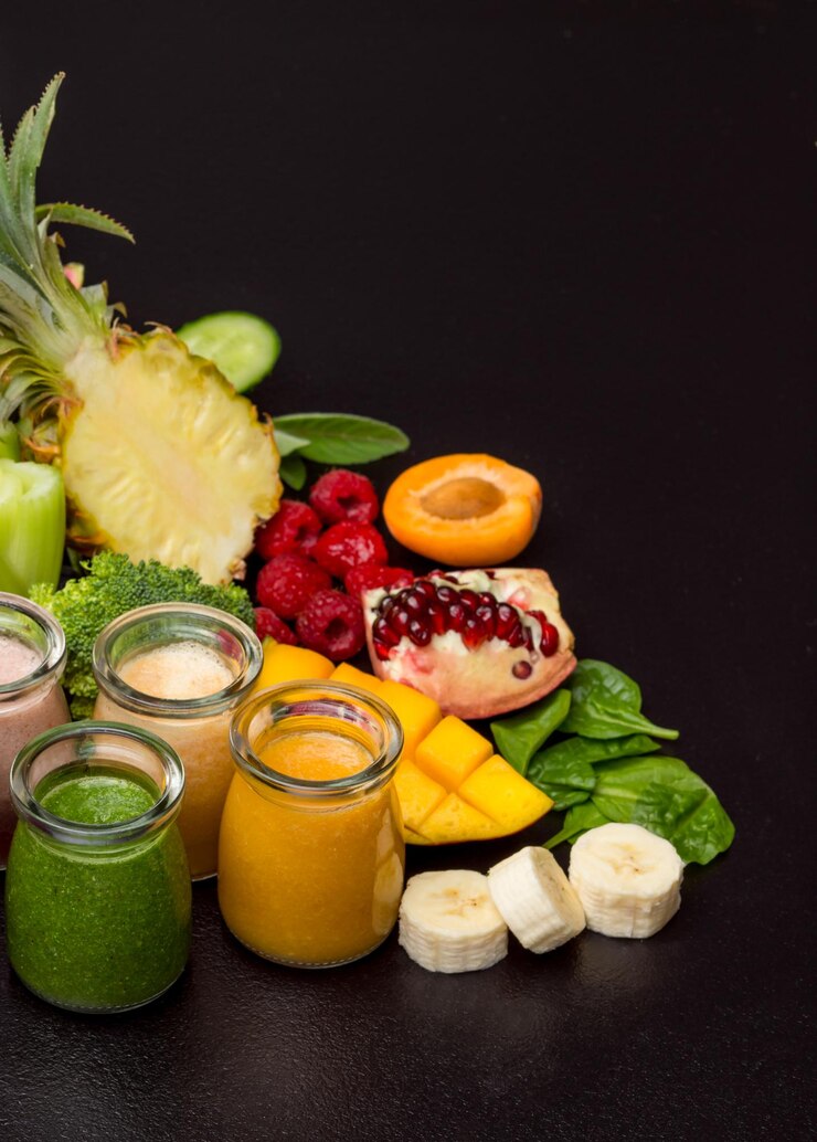group-different-fruit-smoothies-glasses-various-vegetables-fruits_290431-27089